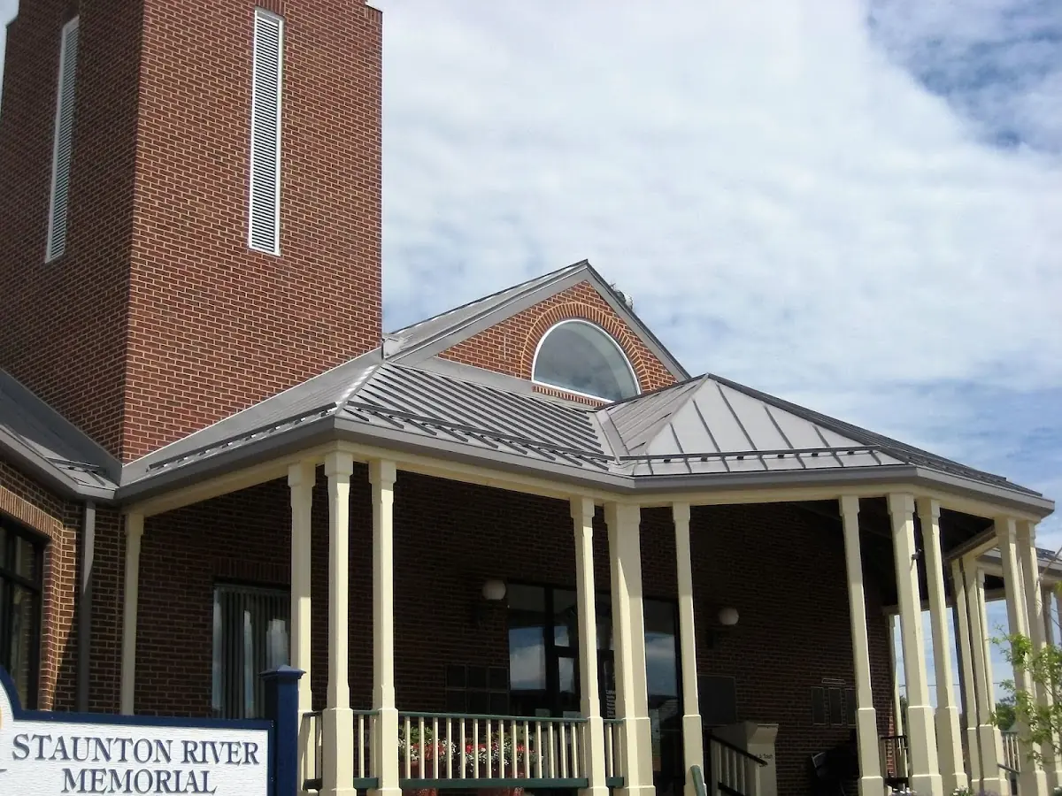 Skilled roofing craftsmen working on a residential roof in Twelve Bridges Village